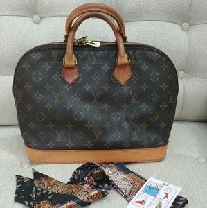 100% Louis Vuitton Alma- Used